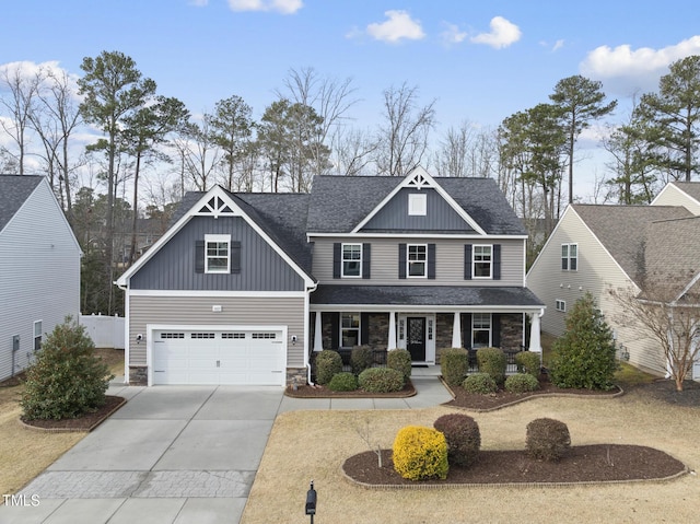 craftsman-style home featuring a garage and covered porch