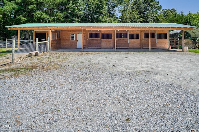 view of front of home with an outdoor structure