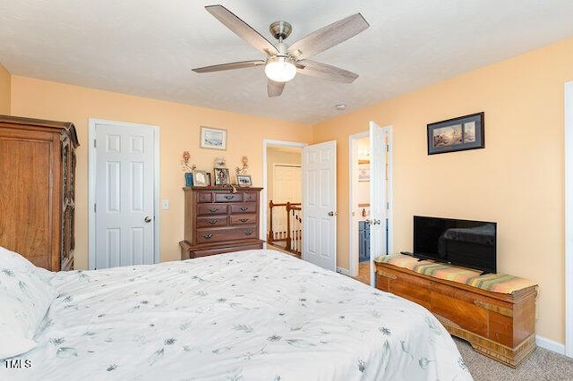 bedroom featuring a ceiling fan, carpet, and baseboards