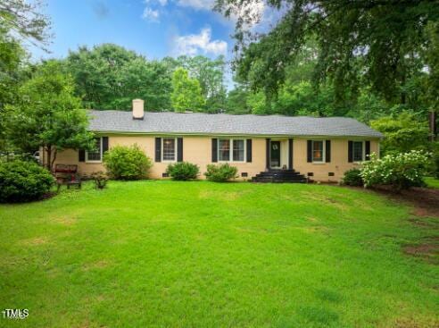 single story home featuring a front yard