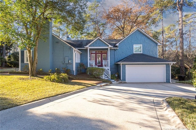 view of front facade with a garage and a front yard