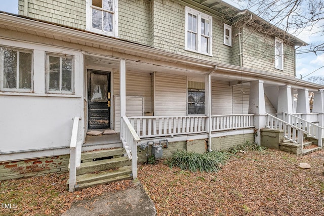 doorway to property featuring a porch