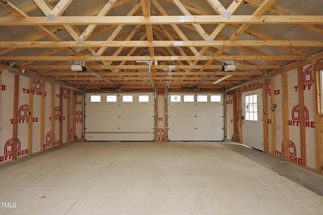 garage featuring a garage door opener