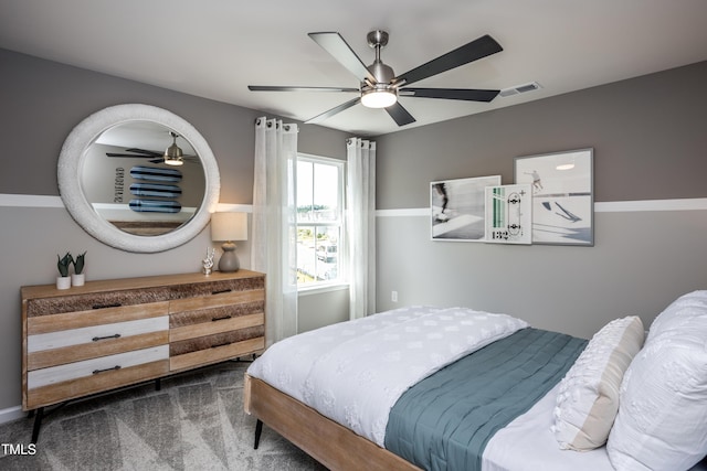 carpeted bedroom featuring ceiling fan