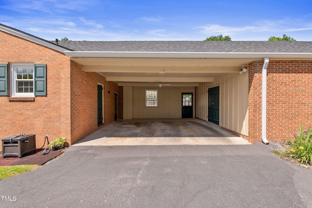 entrance to property featuring a carport