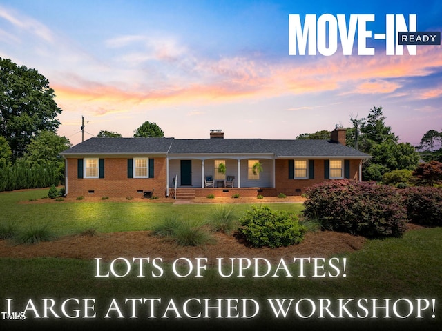 127 Fairfield Cir, Dunn, NC 28334 - single story home with crawl space, brick siding, a chimney, and a porch