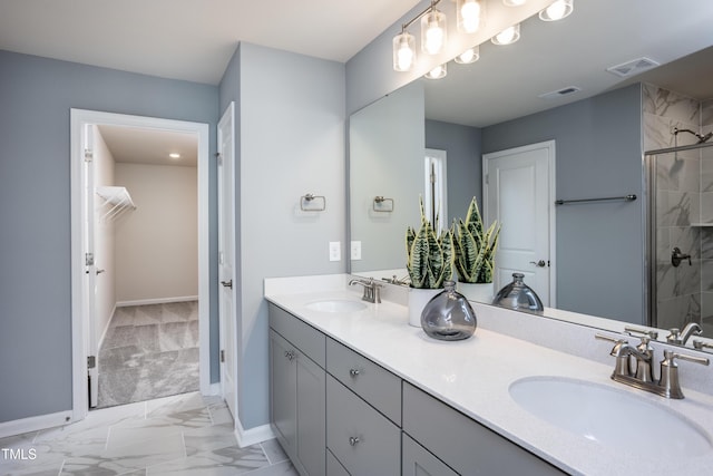 bathroom featuring vanity and walk in shower