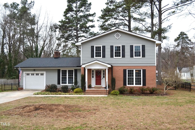 front of property featuring a garage and a front lawn