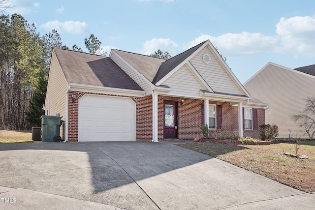 view of front facade with central AC and a garage