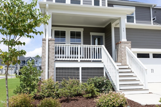 entrance to property with covered porch