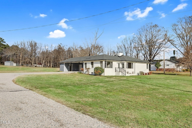 view of front of home featuring a front lawn