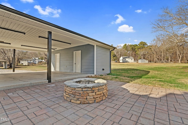 view of patio / terrace featuring a fire pit