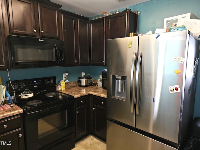 kitchen with light stone countertops, dark brown cabinets, and black appliances