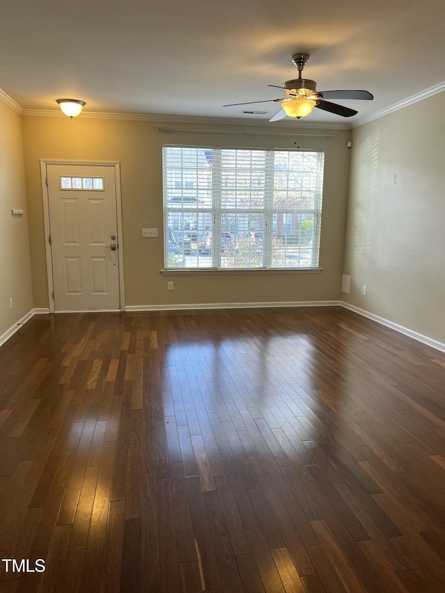 entryway featuring ceiling fan, crown molding, and dark hardwood / wood-style floors