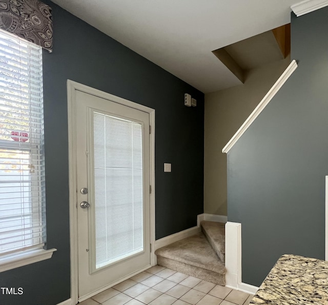 entryway featuring light tile patterned floors