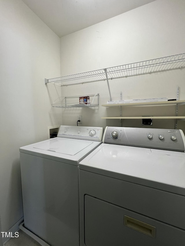 laundry area featuring washer and clothes dryer