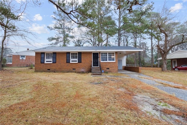 ranch-style home featuring a carport