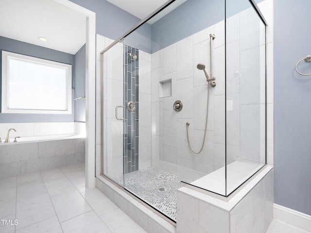 bathroom featuring tile patterned floors and plus walk in shower