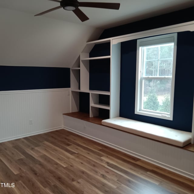 bonus room featuring ceiling fan, wood-type flooring, and lofted ceiling