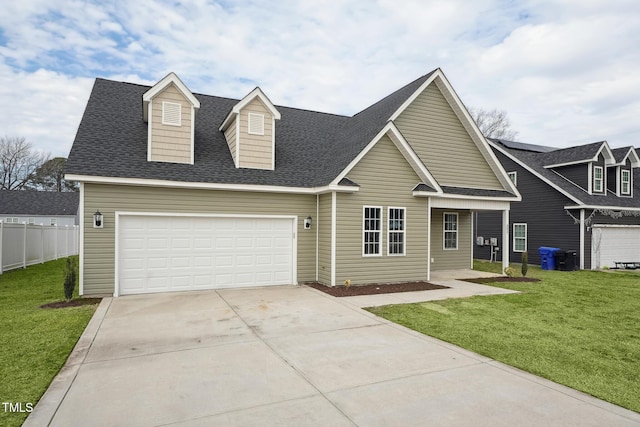 new england style home with a front lawn and a garage