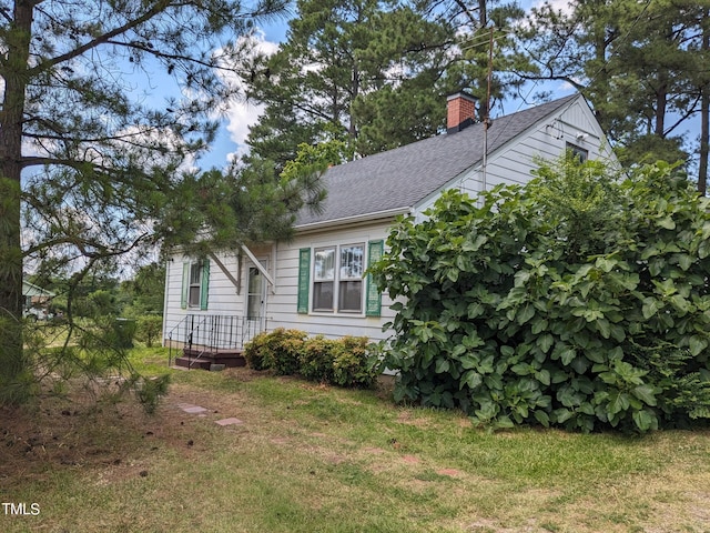 view of front of home with a front yard