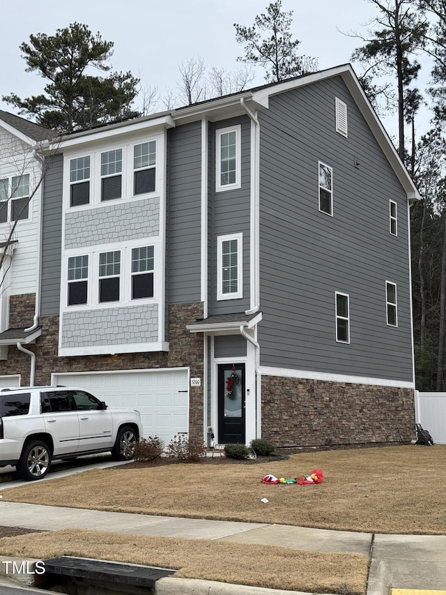 view of front of home with a garage