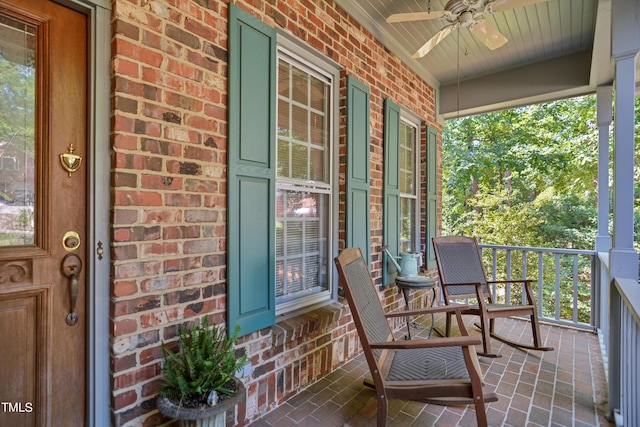 balcony featuring a porch and ceiling fan