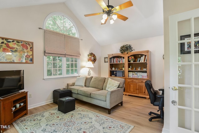 home office with light wood-type flooring, vaulted ceiling, and ceiling fan