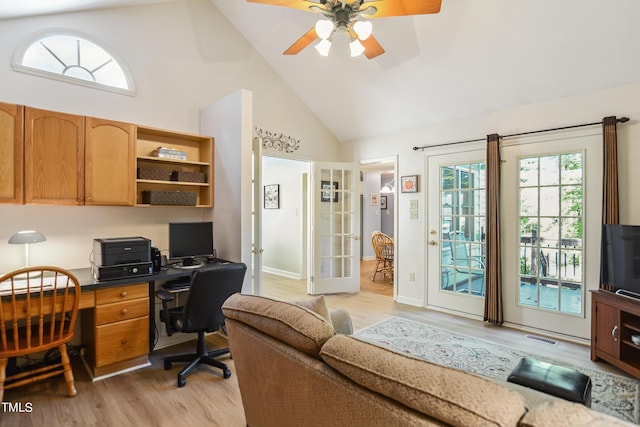 office featuring french doors, high vaulted ceiling, ceiling fan, and light hardwood / wood-style floors