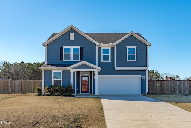 front facade with a front lawn and a garage