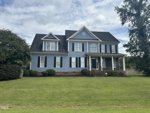 view of front of property with a porch and a front yard