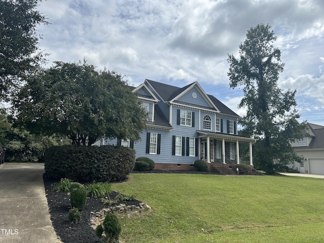 view of front of house featuring a porch and a front yard