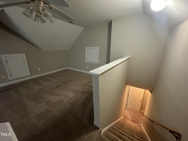 additional living space featuring carpet flooring and lofted ceiling