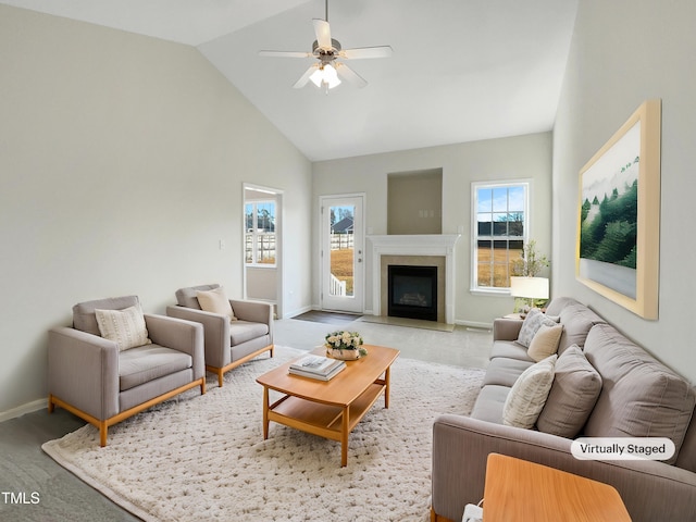 carpeted living room featuring high vaulted ceiling and ceiling fan