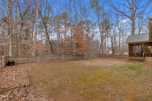 view of yard with a sunroom