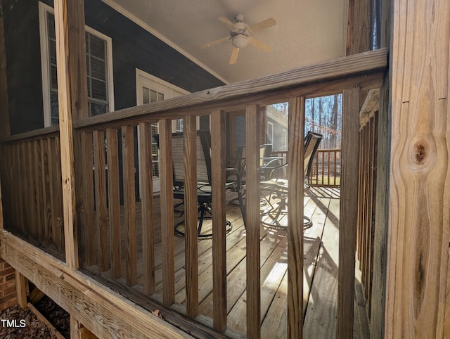 wooden terrace featuring ceiling fan