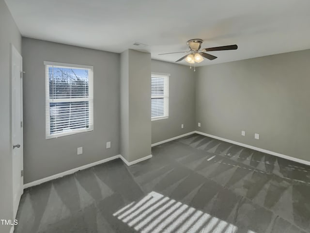 311 Burnette St, Durham, NC 27707 - unfurnished room featuring carpet floors, ceiling fan, and healthy amount of natural light