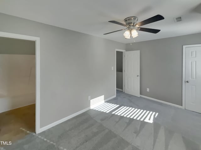 311 Burnette St, Durham, NC 27707 - unfurnished bedroom featuring carpet flooring and a ceiling fan