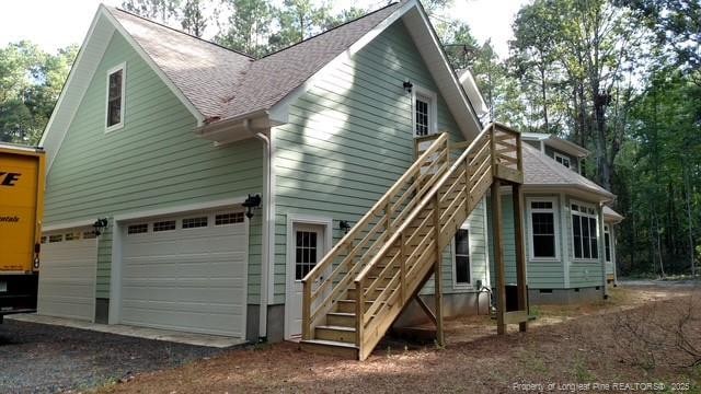 exterior space with a garage