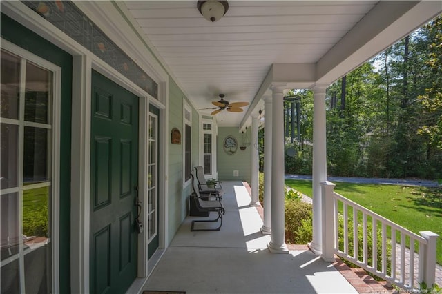 654 Titmouse Ct, Vass, NC 28394 - porch with ceiling fan and a yard
