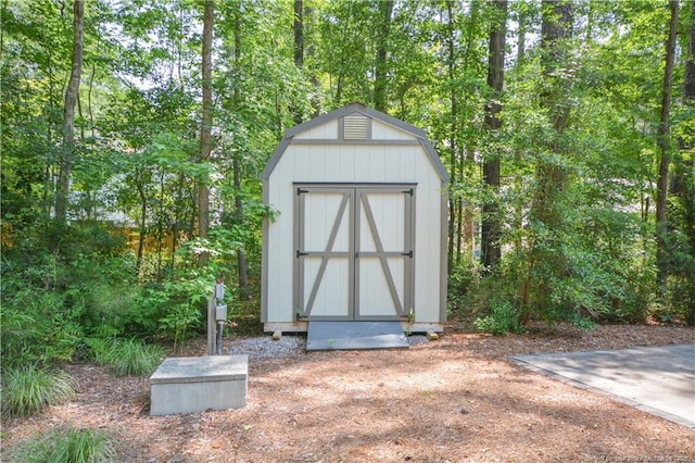 654 Titmouse Ct, Vass, NC 28394 - view of shed with a forest view