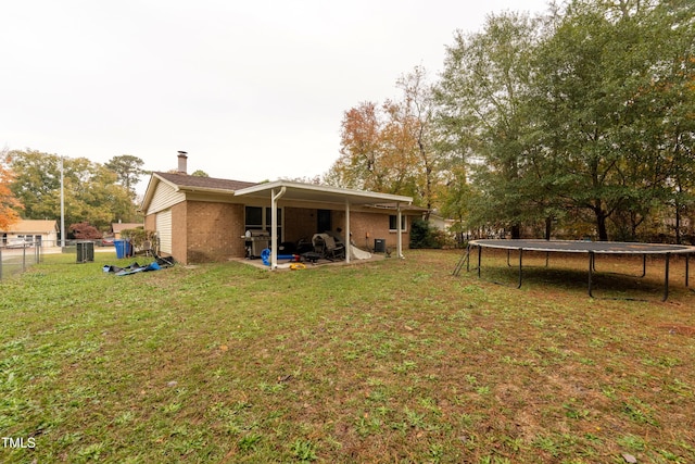 view of yard featuring a trampoline