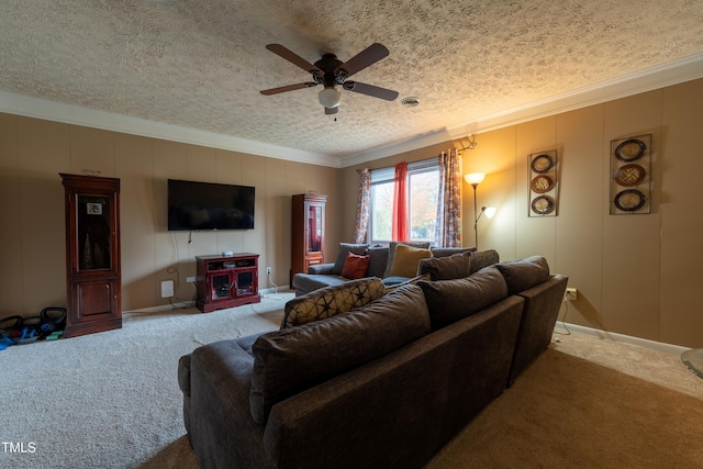 carpeted living room with crown molding, ceiling fan, and a textured ceiling