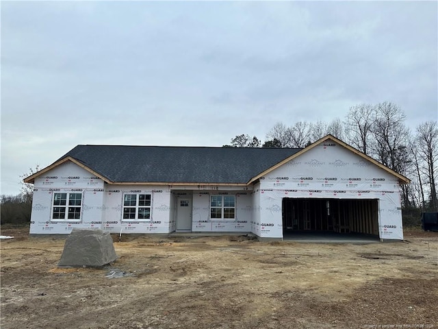 property under construction with a garage