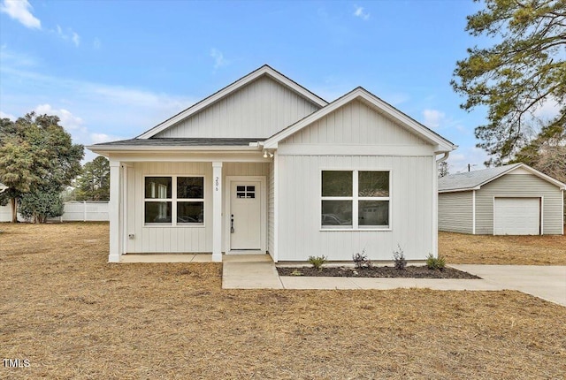 view of front of home with an outdoor structure