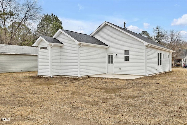 rear view of property with a patio area