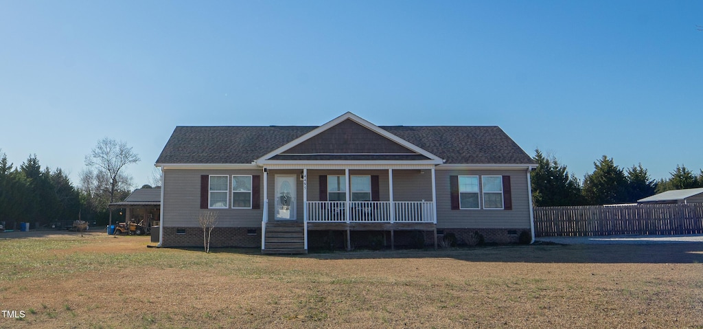 view of front facade with a front lawn and a porch