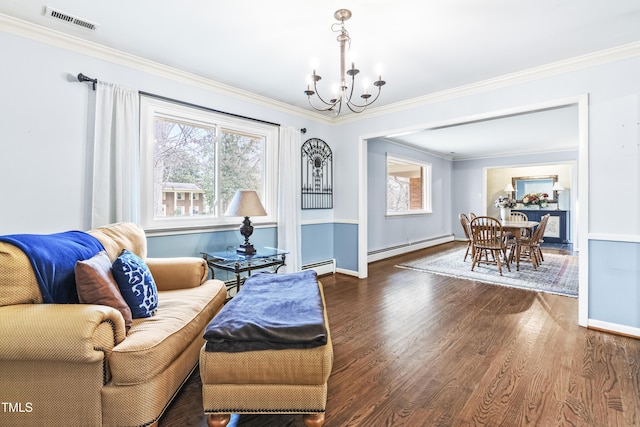 sitting room featuring a baseboard radiator, dark hardwood / wood-style floors, a notable chandelier, and crown molding