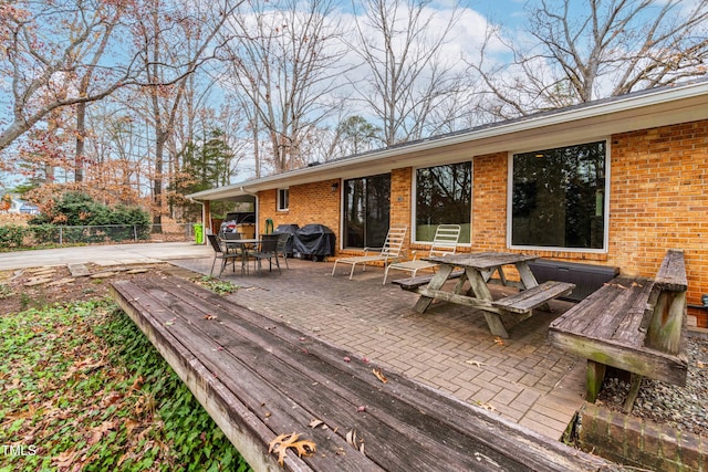 exterior space featuring area for grilling and a patio area