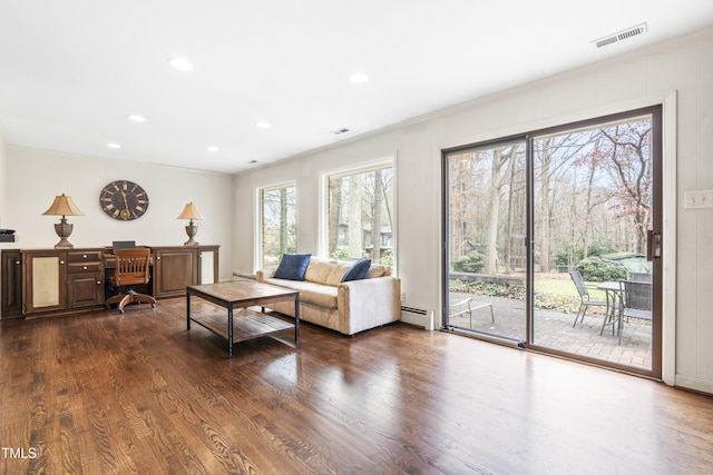 5205 Rembert Dr, Raleigh, NC 27612 - living room featuring baseboard heating, dark wood-style floors, recessed lighting, and an office area